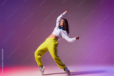 Pretty bright professional dancer performing house dance isolated on ...