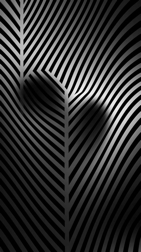 A 4k Ultra Hd Mobile Wallpaper With A Minimalist Abstract Heart Shaped Pattern In Black And