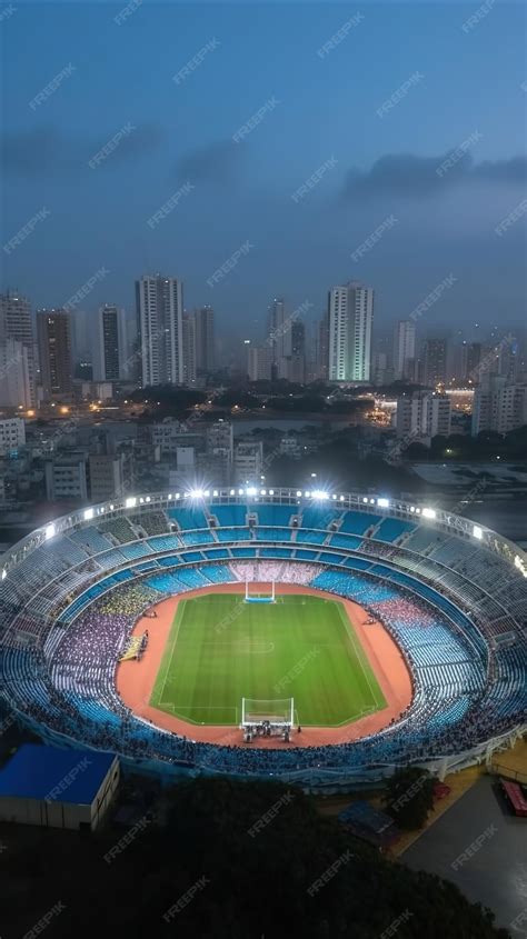 Premium AI Image | A stadium with a view of the city skyline at night.