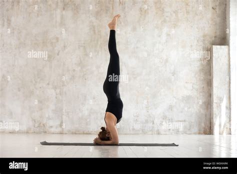 Beautiful Woman Practicing Yoga Doing Headstand Exercise Salamba