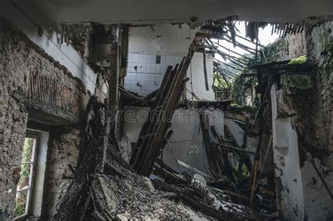 Ruins And Debris Of Destroyed House By Human Or Natural Disaster