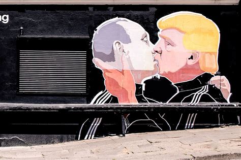 Trump And Putin Kiss Passionately On The Side Of A Barbecue Restaurant