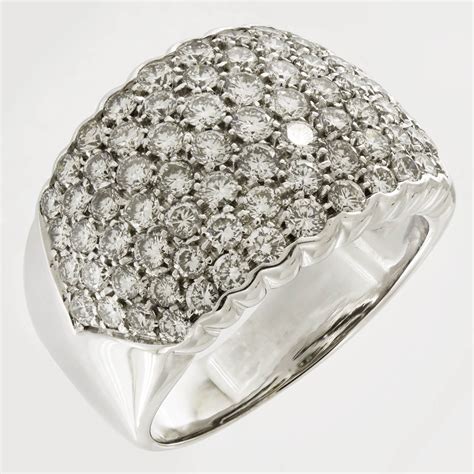 Anello Fascia In Oro Bianco 18KT Con Diamanti Centrali Taglio Baguette