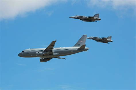 Military transport plane at air base. Air force flight operation ...