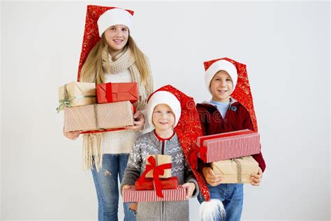 Kids celebrating christmas stock image. Image of happy - 105619613