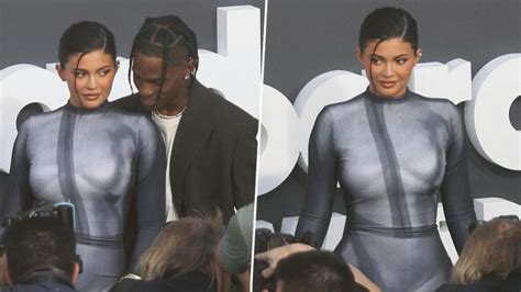 Kylie Jenner Rocks A Naked Illusion Dress For BBMAs As She Walks With Rapper Travis Scott