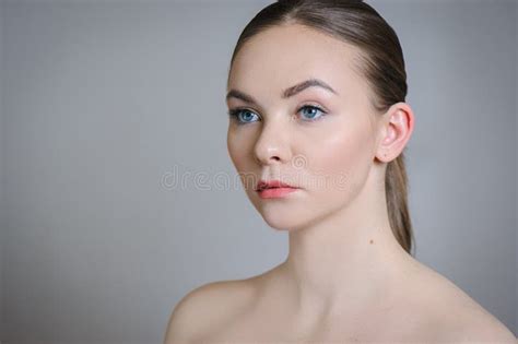 Beautiful Adult Girl Posing With Nude Makeup With Clean Skin And Care Her Skin Stock Photo