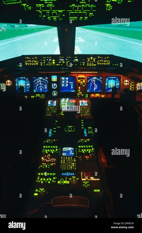 Boeing 777-200 cockpit simulator with runway in view Stock Photo - Alamy