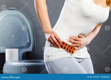 Woman Suffer From Belly Pain Holds Pills In Toilet Stock Image Image