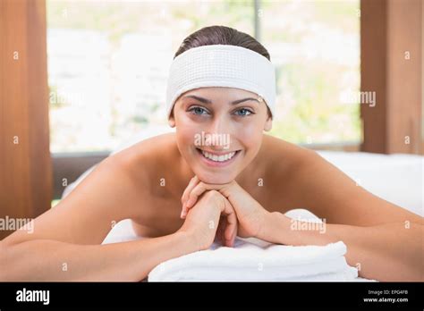 Beautiful Smiling Brunette Lying On Massage Table Stock Photo Alamy