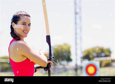 Female Athlete Practicing Archery Stock Photo Alamy