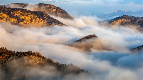 A rarely-seen Beijing: 'heavenly mountains' in clouds - CGTN