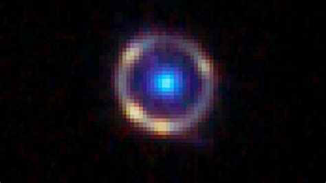 Rare 'Einstein Ring' phenomenon spotted 12BILLION lightyears away by ...