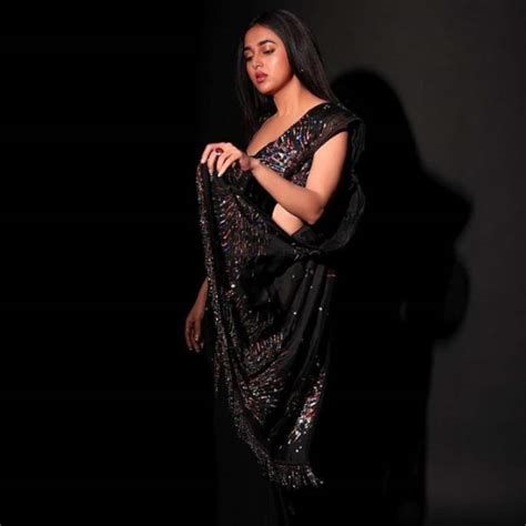 Bigg Boss 15 Winner Tejasswi Prakash Dazzles In A Black Shimmer Saree