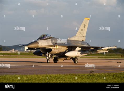 A U S Air Force F 16 Fighting Falcon Assigned To The 8th Fighter Wing Taxis Down The Runway In