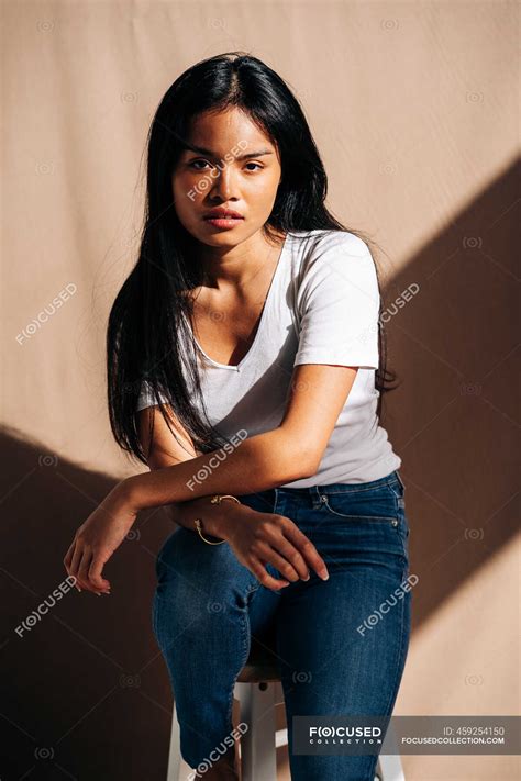 Full Body Of Confident Young Hispanic Lady Wearing Casual Clothes