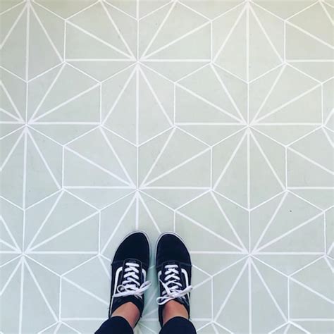 Hexagonal Mint Green Floor Tiles With White Converging Line Pattern