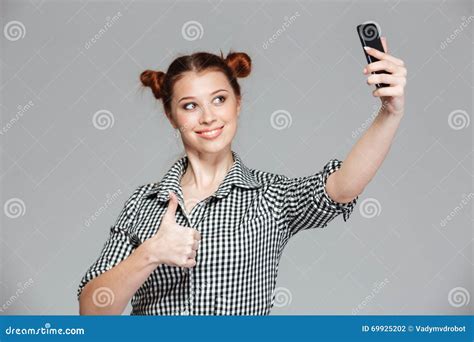 Cheerful Woman Showing Thumbs Up And Taking Selfie With Smartphone