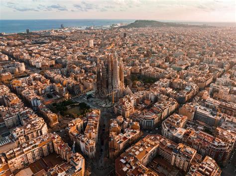 Aerial View Of Barcelona City Skyline And Sagrada Familia Cathedral At