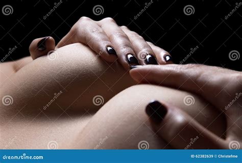 Woman S Hands Holding Naked Breasts In The Dark Stock Image Image Of Lying Nude