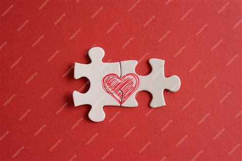 Premium Photo Connected Jigsaw Puzzle Pieces With Red Heart Icon On