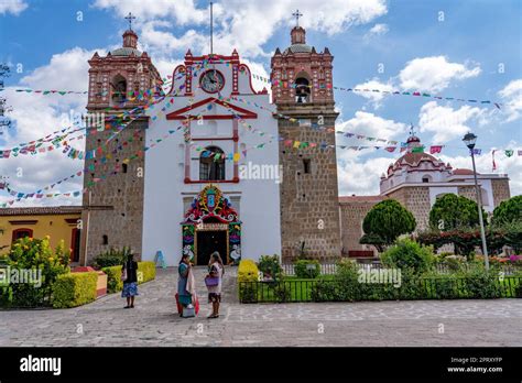 Indigenous Zapotec Women In Traditional Dress In Front Of The Church In