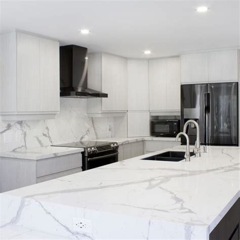 Statuario White Marble Countertops For Elegant White Kitchen