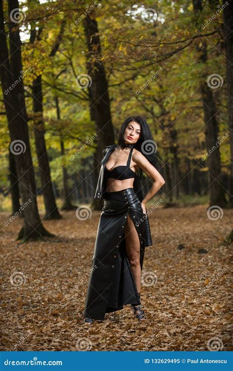 Beautiful Dark Haired Young Woman Wearing A Black Bra Leather Jacket