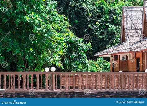 Beach Resort with Nipa Hut Cottages and Forest Stock Photo - Image of ...