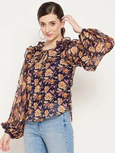 Printed Navy Blue And Brown Floral Print Tie Up Neck Ruffles Georgette