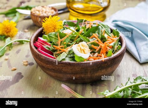 Fresh dandelion salad Stock Photo - Alamy