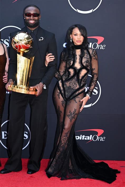 WNBA Star Kysre Gondrezick Goes Sheer in Lingerie-inspired Dress With ...