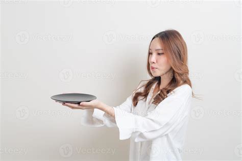 Asian Woman Holding Empty Plate 3303493 Stock Photo At Vecteezy