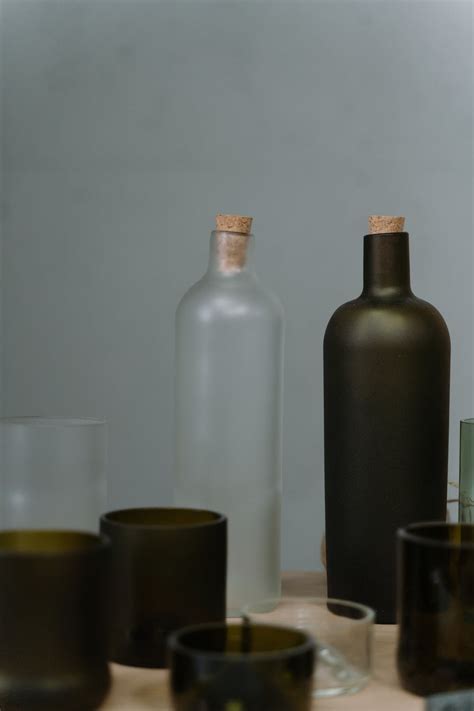 Glass Bottles in Different Shapes and Sizes · Free Stock Photo