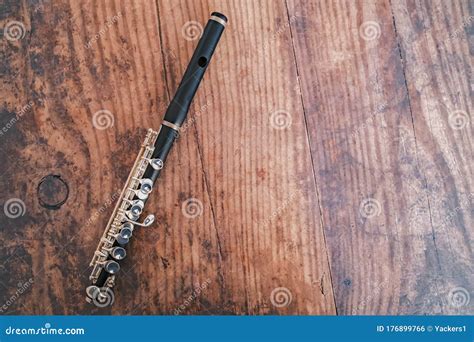 Top Down View Of Wooden Flute On Hardwood Floor Stock Photo Image Of