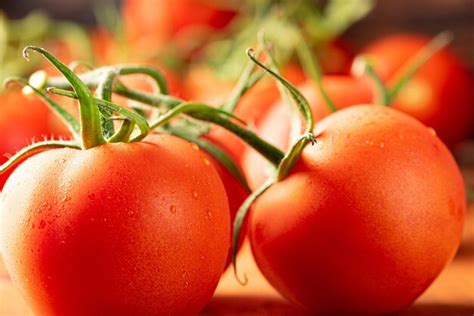 Premium Photo Tomatoes Beautiful Details Of Fresh Red Tomatoes On