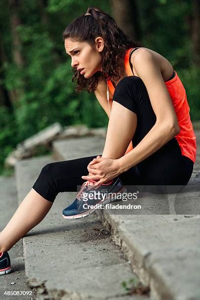 Young Woman Sitting Hugging Her Knee Photos Et Images De Collection