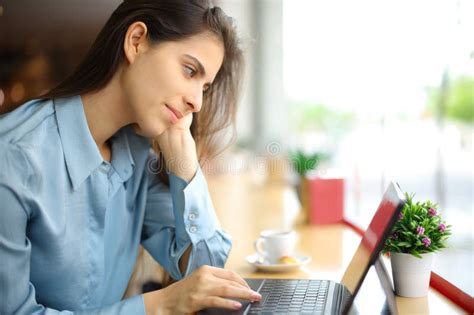 Woman Using Laptop or Tablet in a Coffee Shop Stock Image - Image of ...