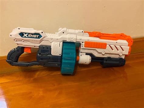 X shot gun, 兒童＆孕婦用品, 嬰兒玩具 - Carousell
