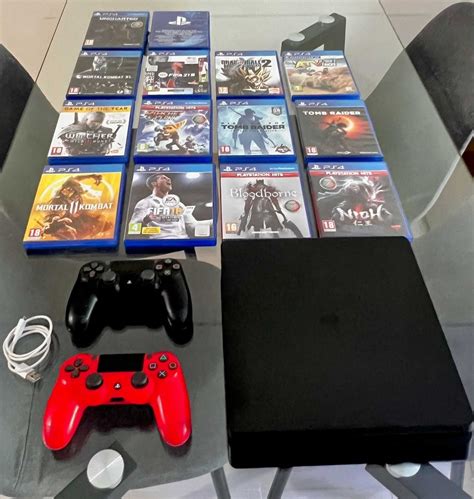 PS4 PlayStation 4 Slim 1TB 2 Comandos 13 Jogos Fisicos Palmeira