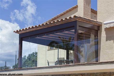 Cerramiento Para Terraza Con Cortinas De Cristal En La Costa Alurei