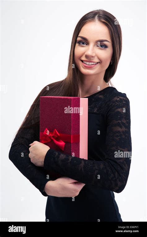 Smiling Cute Woman In Black Dress Holding T Box Isolated On A White