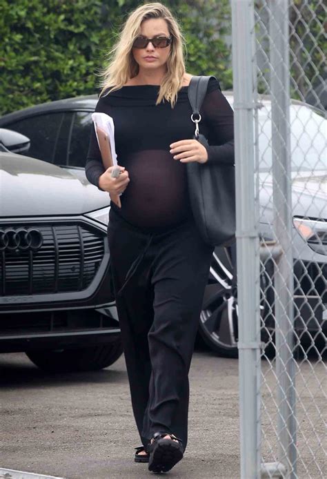 Pregnant Margot Robbie Shows Off Her Baby Bump in Sheer Black Look ...