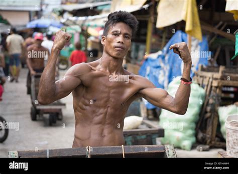 young filipino man working   carbon market cebu city