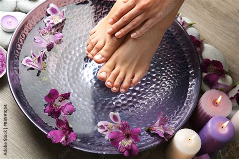 Female feet at spa pedicure procedure Stock Photo | Adobe Stock