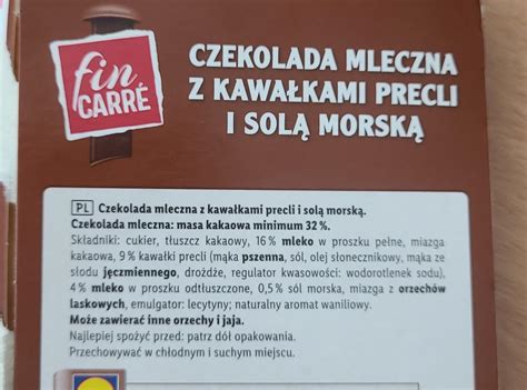 Czekolada mleczna z kawalkami precli i sola morska Fin Carré kalorie