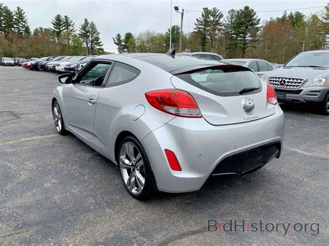 Report KMHTC6AD5CU053598 HYUNDAI VELOSTER 2012 SILVER GAS Price And