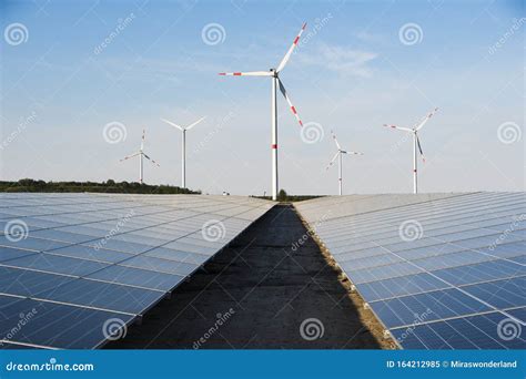 Windmill And Solar Panels On A Blue Sky Stock Image Image Of