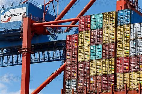 Container Loading Onto A Container Ship At The Eurogate Container