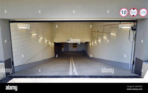 New modern residential apartment house building, garage parking concept Stock Photo - Alamy